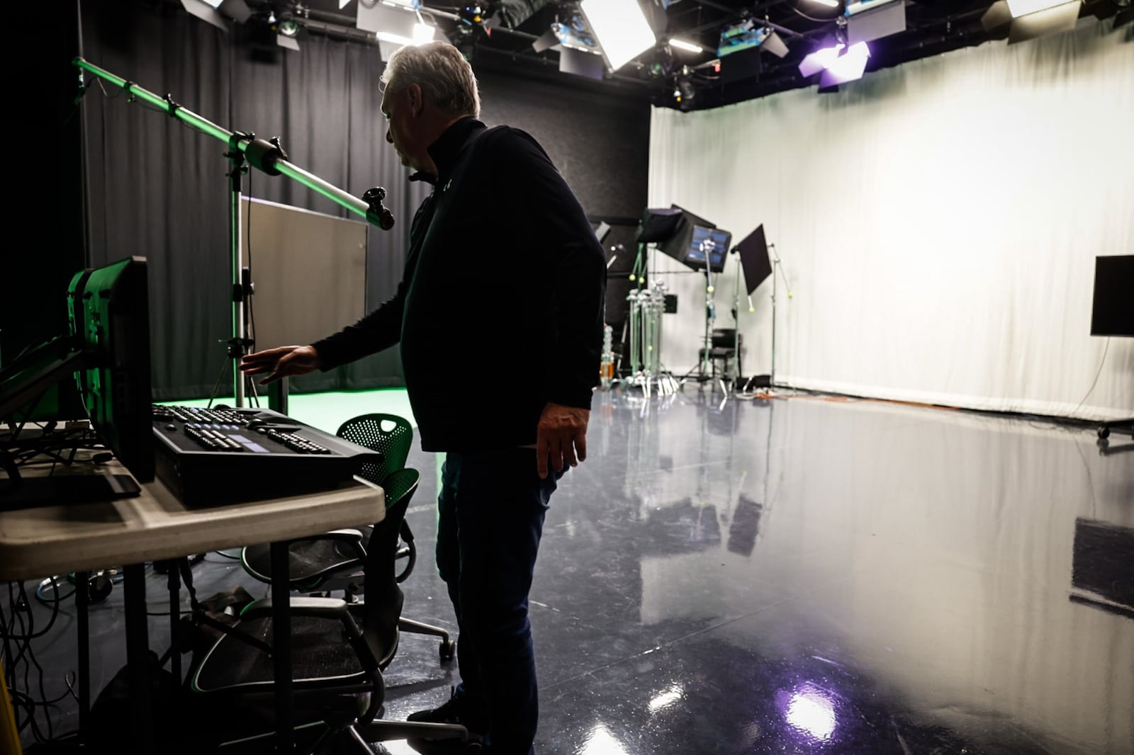 University of Dayton principal lecturer Roy Flynn works in the media production facility at the now open Roger Glass Center for the Arts. JIM NOELKER/STAFF