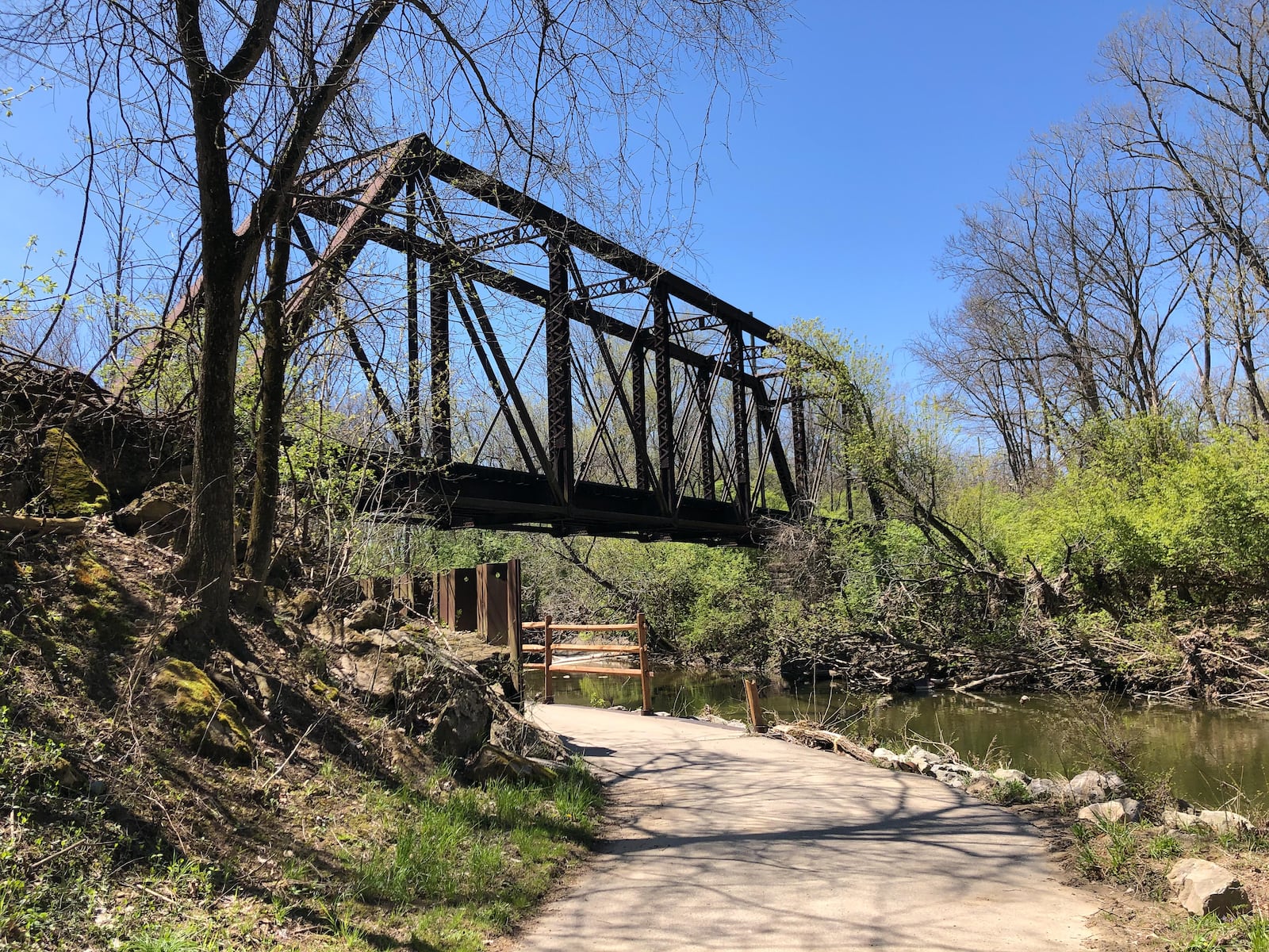 Wesleyan MetroPark, located in the City of Dayton on Wolf Creek, features a paved trail featuring a picturesque railroad bridge and two nature trails. Prior to becoming part of Five Rivers MetroParks in 1995, the park was known as the Wesleyan Nature Center.  TOM GILLIAM / CONTRIBUTING PHOTOGRAPHER