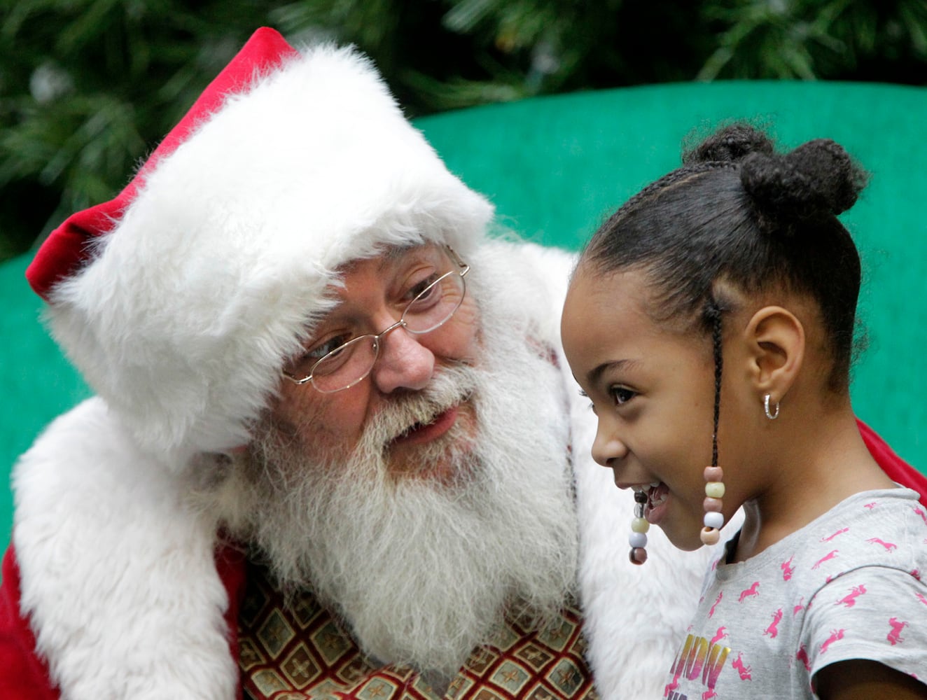 PHOTOS: A visit with Santa Claus makes the holiday season magical