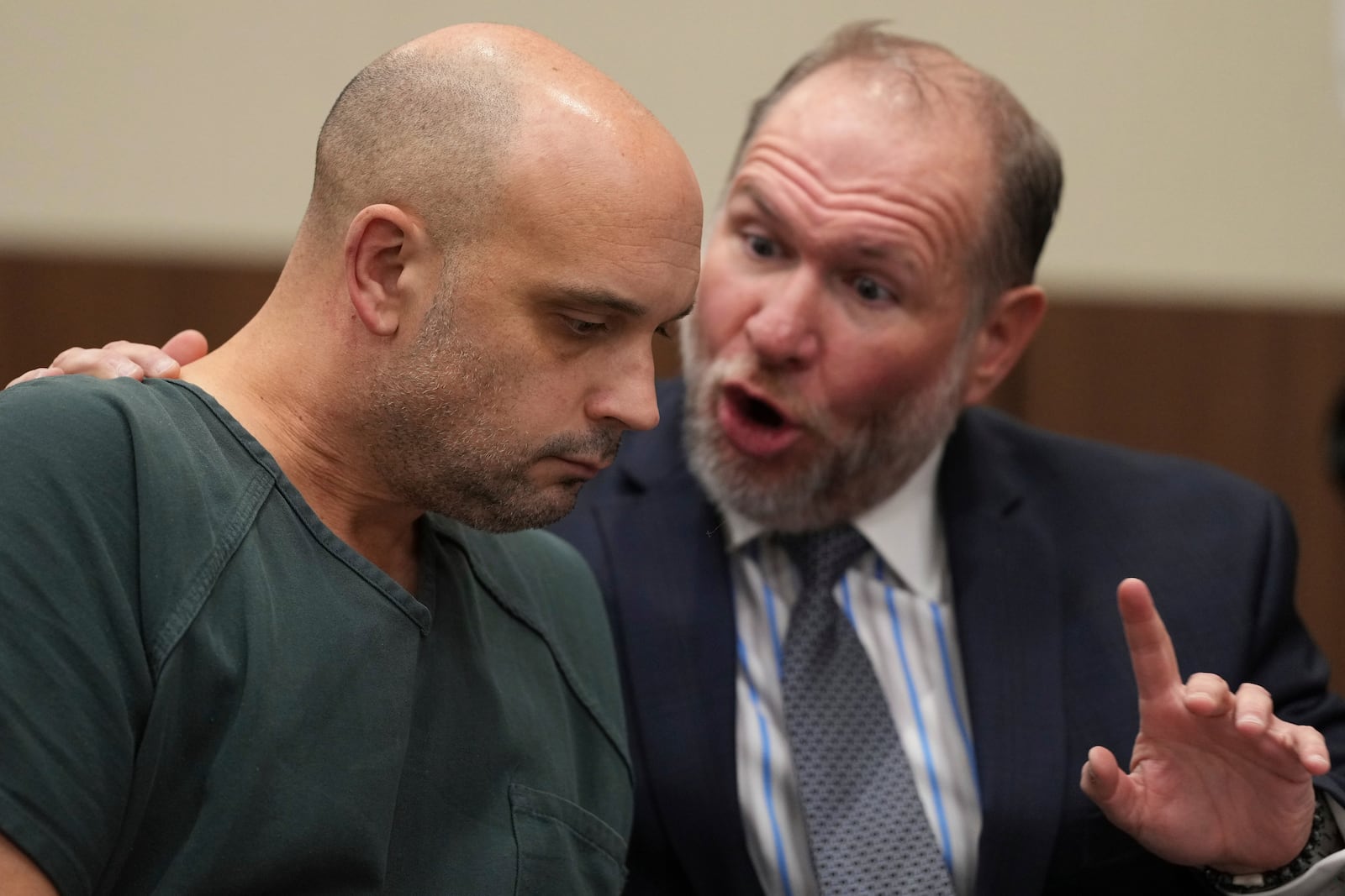 Sean M. Higgins, left, the driver charged with killing NHL hockey player Johnny Gaudreau and his brother Matthew as they bicycled on a rural road, listens to lawyer Richard Klineburger during an appearance at the Salem County, N.J., Courthouse, Tuesday, Nov. 12, 2024, in Salem, N.J. (AP Photo/Matt Slocum)