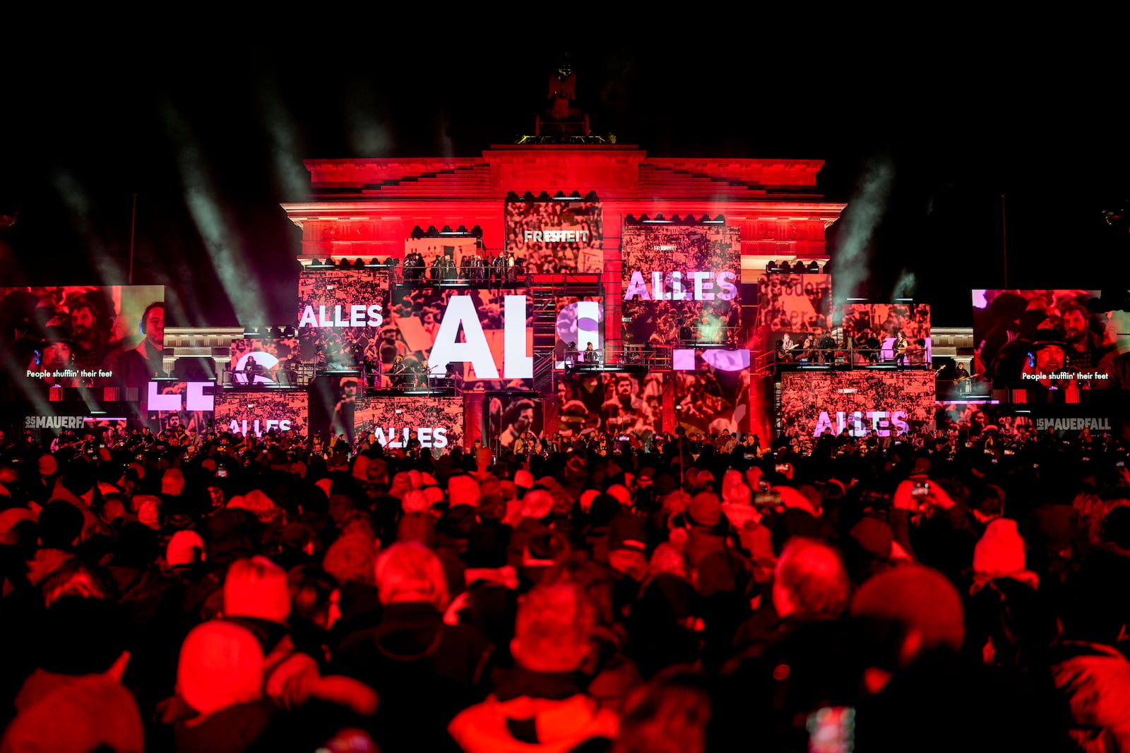 Musicians play on the stage during the concert for freedom for the 35th anniversary of the fall of the Berlin Wall, at the Brandenburg Gate in Berlin, Germany, Saturday, Nov. 9, 2024. (AP Photo/Ebrahim Noroozi)