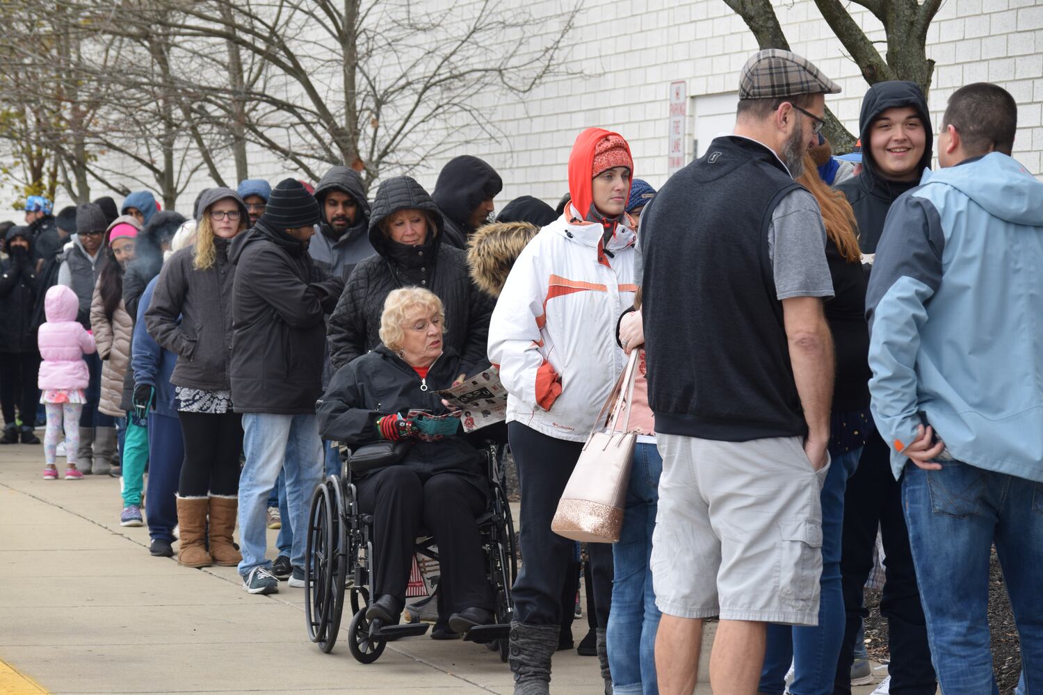 PHOTOS: Hundreds like up outside JCPenney for doorbusters, coupons