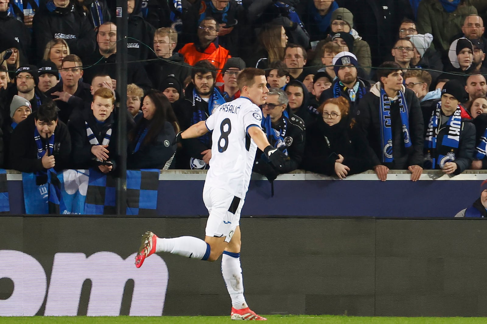 Atalanta's Mario Pasalic celebrates after scoring against Brugge during the Champions League playoff first leg soccer match between Club Brugge and Atalanta at the Jan Breydel Stadium in Bruges, Belgium, Wednesday, Feb. 12, 2025. (AP Photo/Geert Vanden Wijngaert)