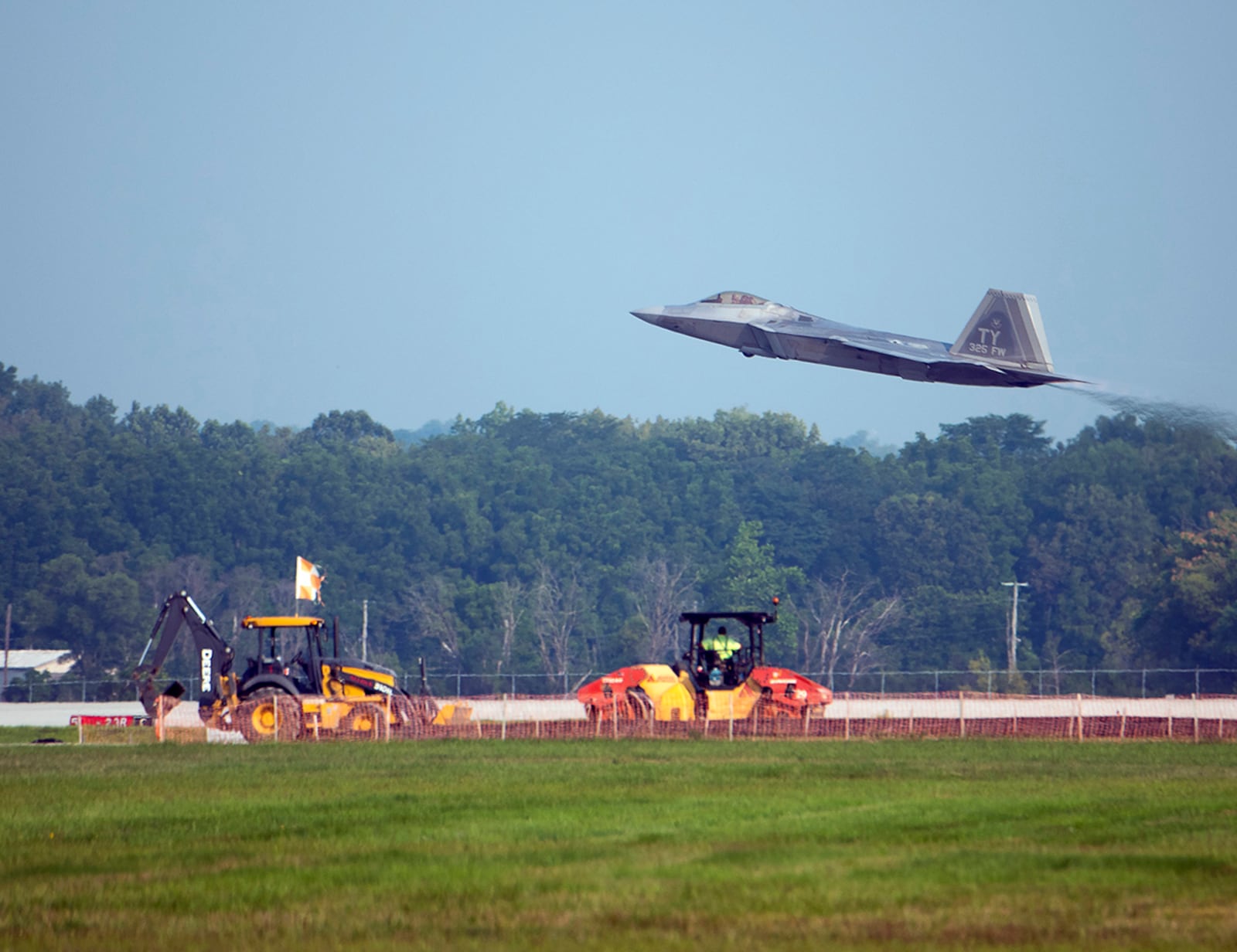 A U.S. Air Force F-22 Raptor takes off from Wright-Patterson Air Force Base Aug. 26, heading home to Eglin Air Force Base, Fla. (U.S. Air Force photo/R.J. Oriez)