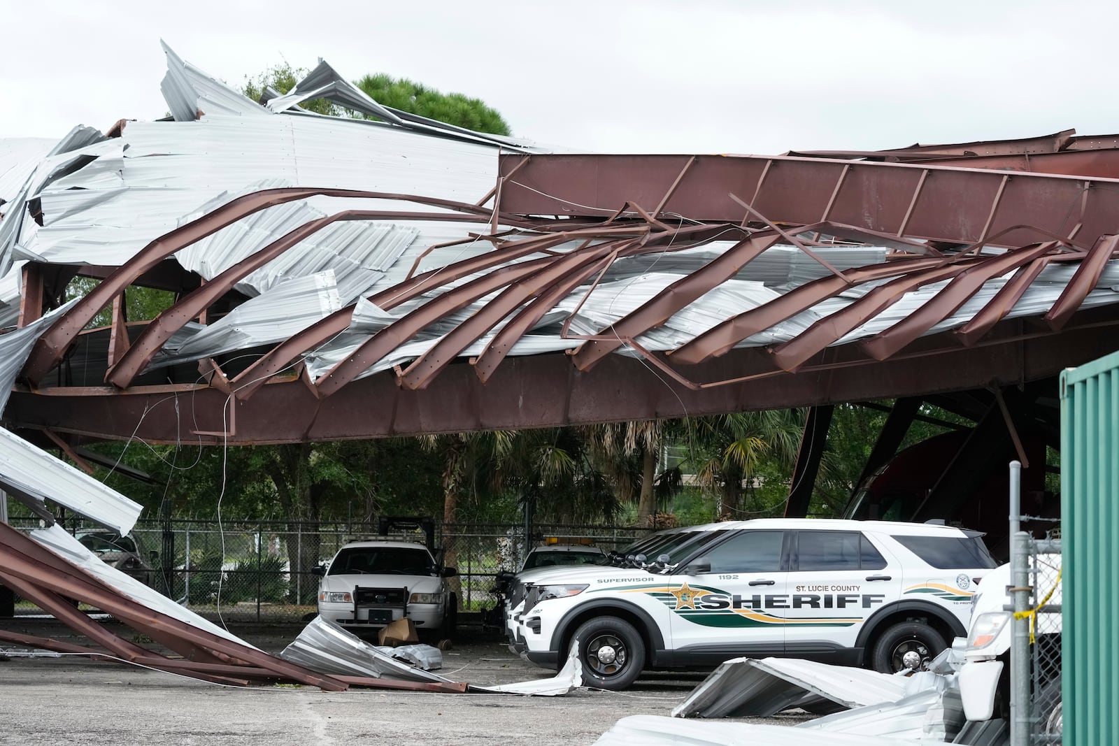 A St. Lucie County Sheriff's parking facility is shown after a tornado spawned ahead of Hurricane Milton destroyed it, Thursday, Oct. 10, 2024, in Fort Pierce, Fla. (AP Photo/Wilfredo Lee)