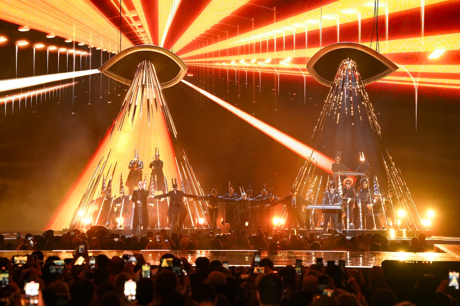 Neil Tennant, left, and Chris Lowe from the 'Pet Shop Boys' perform alongside the Manchester Camerata during the MTV European Music Awards in Manchester, England, Sunday, Nov. 10, 2024. (Scott A Garfitt/Invision/AP)