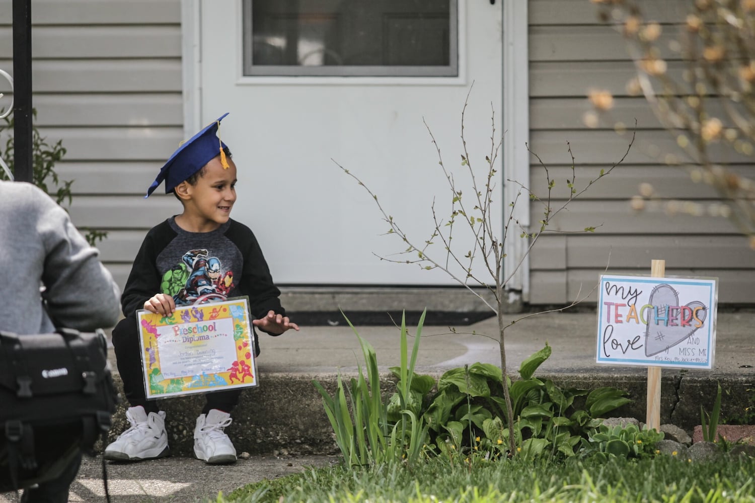 Pre-school porch graduation delights local neighborhood