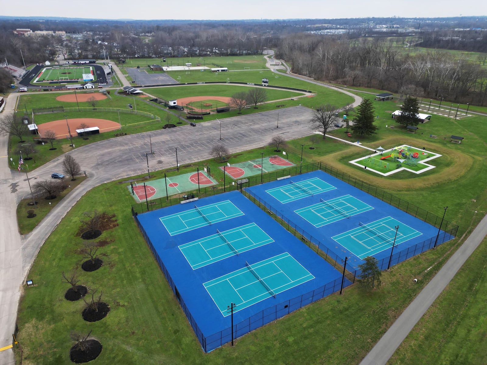 In 2025, the Ohio Department of Transportation is constructing a roundabout on Ohio 123 (East Sixth Street) near Community Park, pictured, and Dial parks.  NICK GRAHAM/STAFF