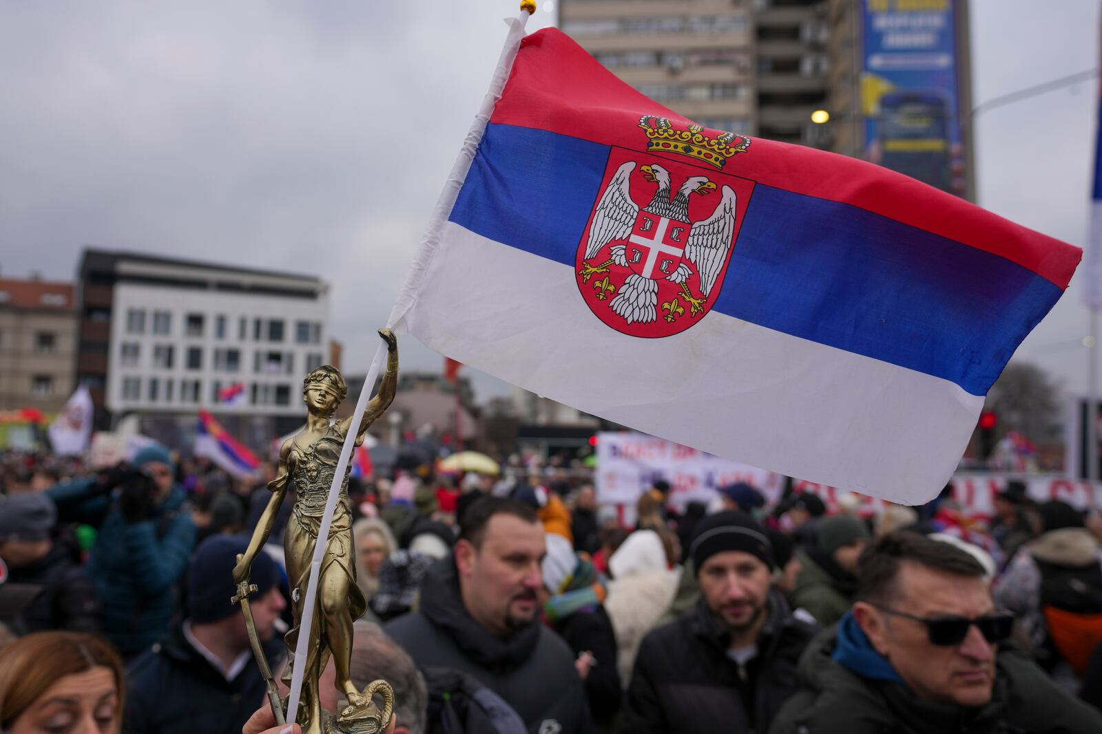 People attend a protest triggered after a concrete canopy on a railway station in the northern city of Novi Sad collapsed on Nov. 1, 2024 killed 15 people, in Kragujevac, Serbia, Saturday, Feb. 15, 2025. (AP Photo/Darko Vojinovic)