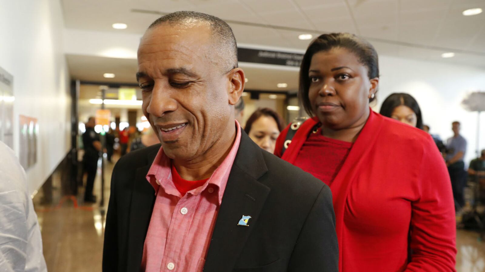 Bertrum Jean leaves court in Dallas on Tuesday, Oct. 1, 2019, after former police officer Amber Guyger's conviction for the 2018 murder of Jean's son, Botham Jean. Guyger shot Botham Jean, her neighbor, after going to his apartment by mistake.