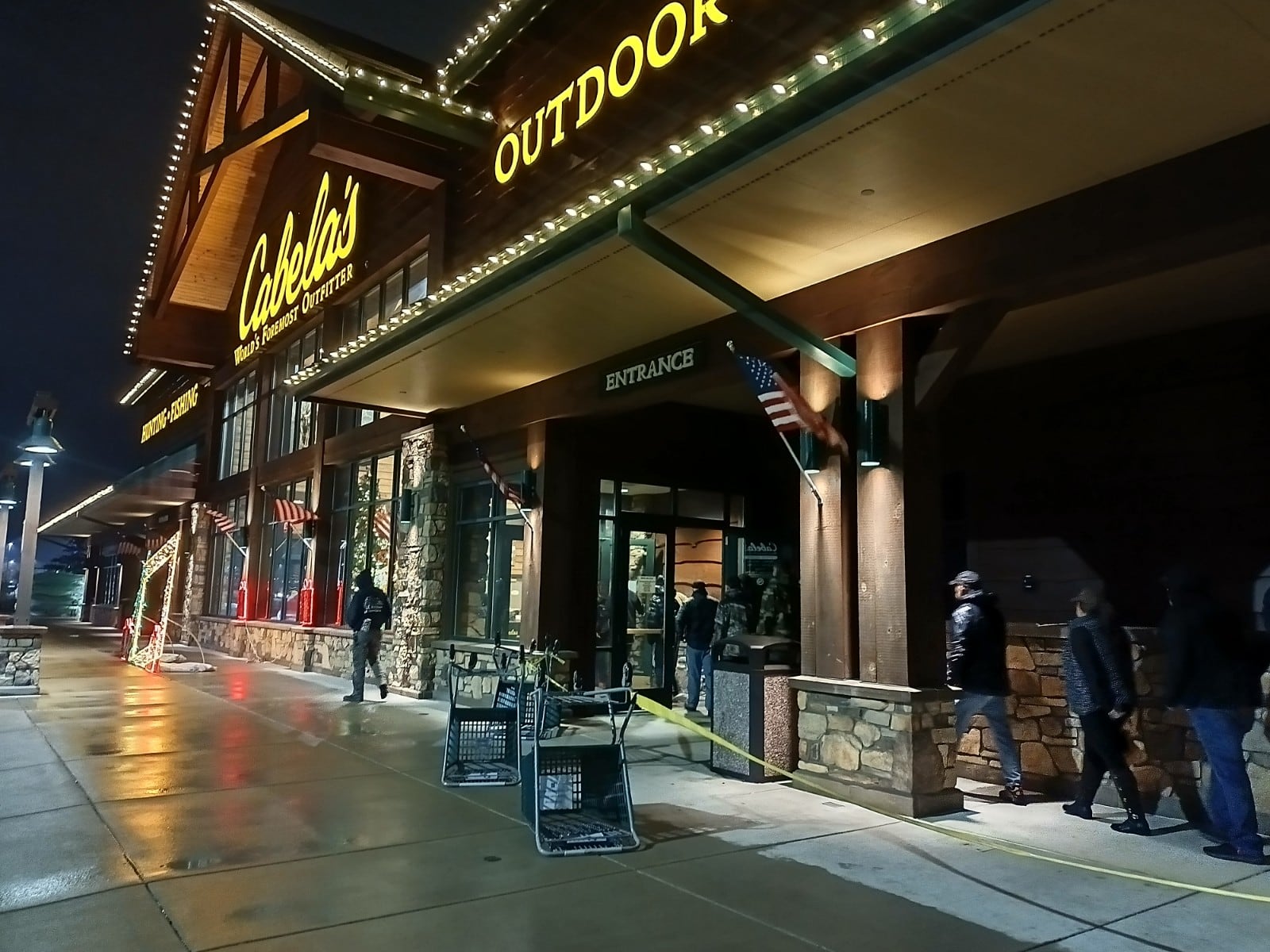 Black Friday shoppers head inside Cabela's in Centerville after the doors opened at 5 a.m. on Friday, Nov. 25, 2022. SAMANTHA WILDOW\STAFF