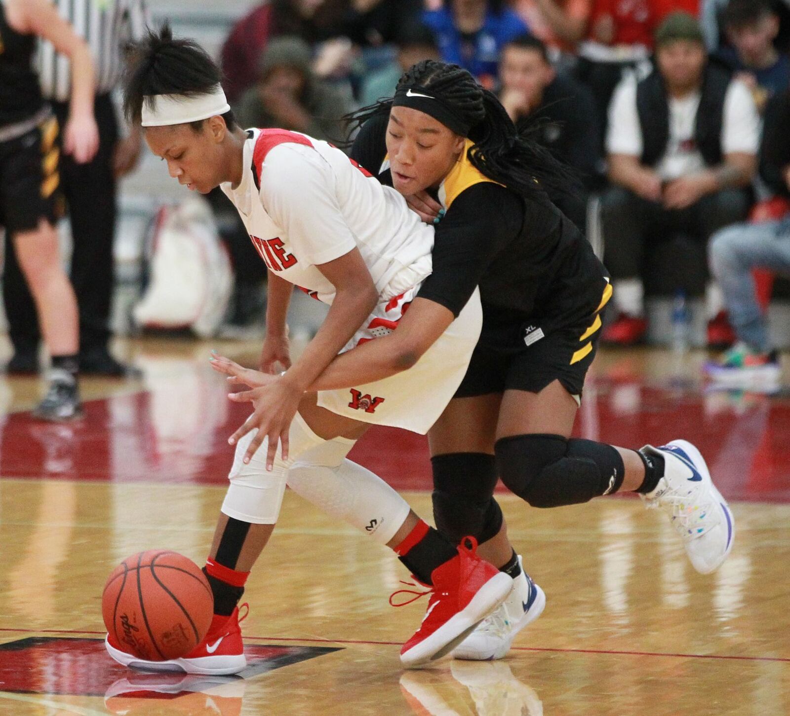 Cotie McMahon of Centerville (right) tries to pick Nyla Hampton. Wayne defeated visiting Centerville 56-37 in a GWOC girls high school basketball game on Wednesday, Dec. 11, 2019. MARC PENDLETON / STAFF