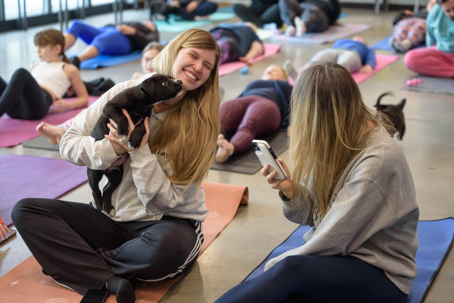 PHOTOS: Puppy Yoga at SICSA Pet Adoption and Wellness Center