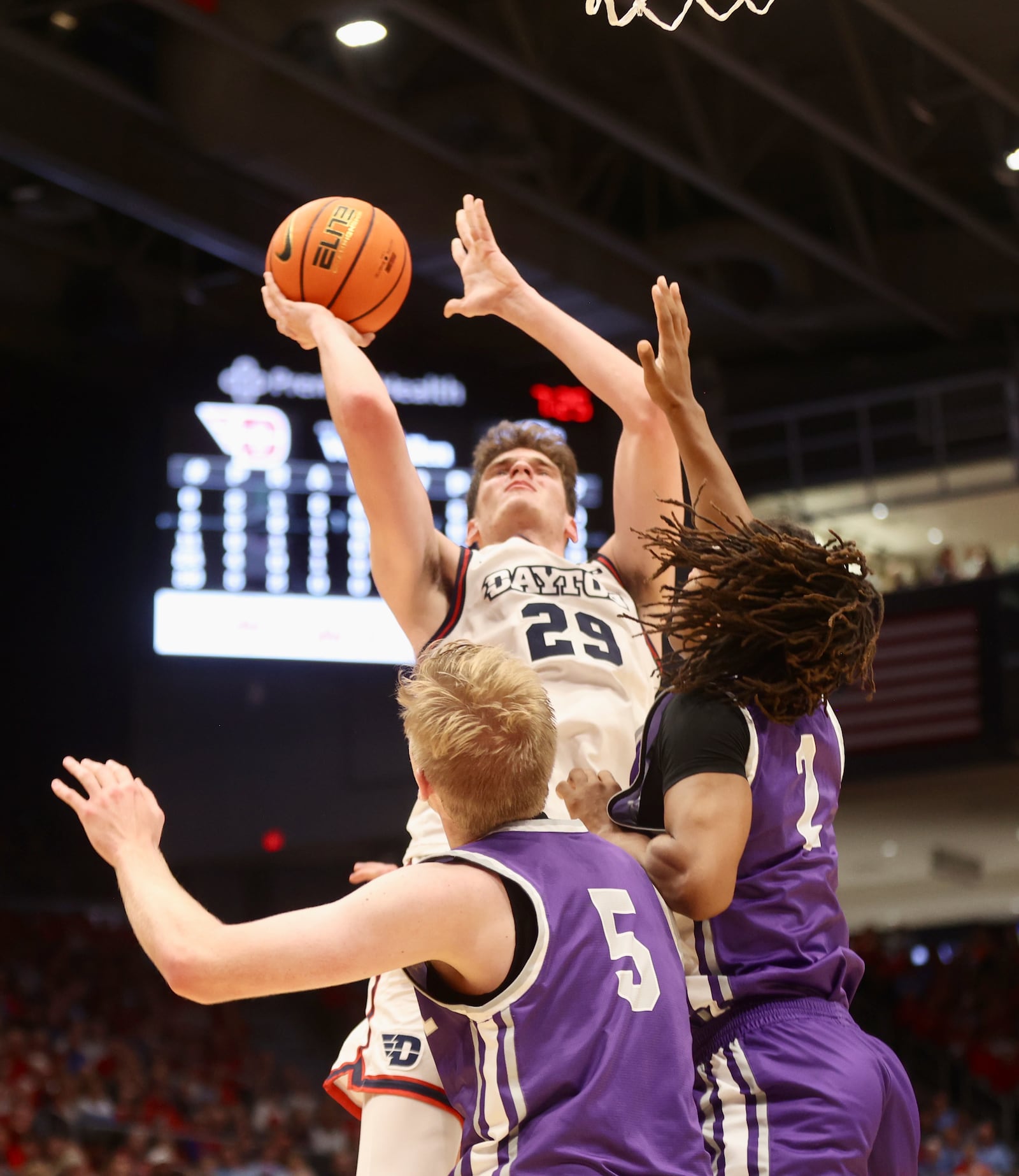 Dayton's Amaël L'Etang shoots against Capital on Saturday, Nov. 16, 2024, at UD Arena. David Jablonski/Staff