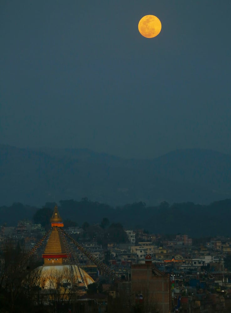 Photos: 'Super snow moon,' largest supermoon of 2019, lights up the sky