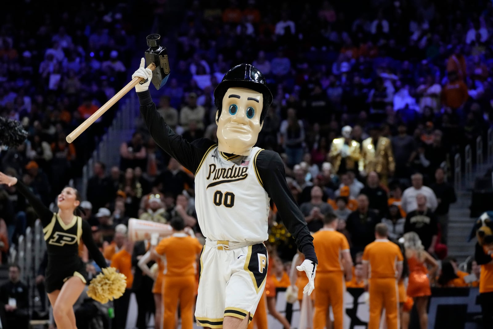 Purdue Pete, the Purdue mascot, performs during the first half of an Elite Eight college basketball game against Tennessee in the NCAA Tournament, Sunday, March 31, 2024, in Detroit. (AP Photo/Paul Sancya)