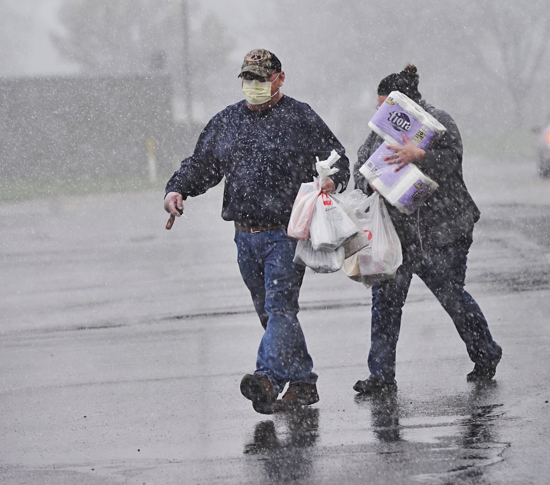 Hail, some flurries fall