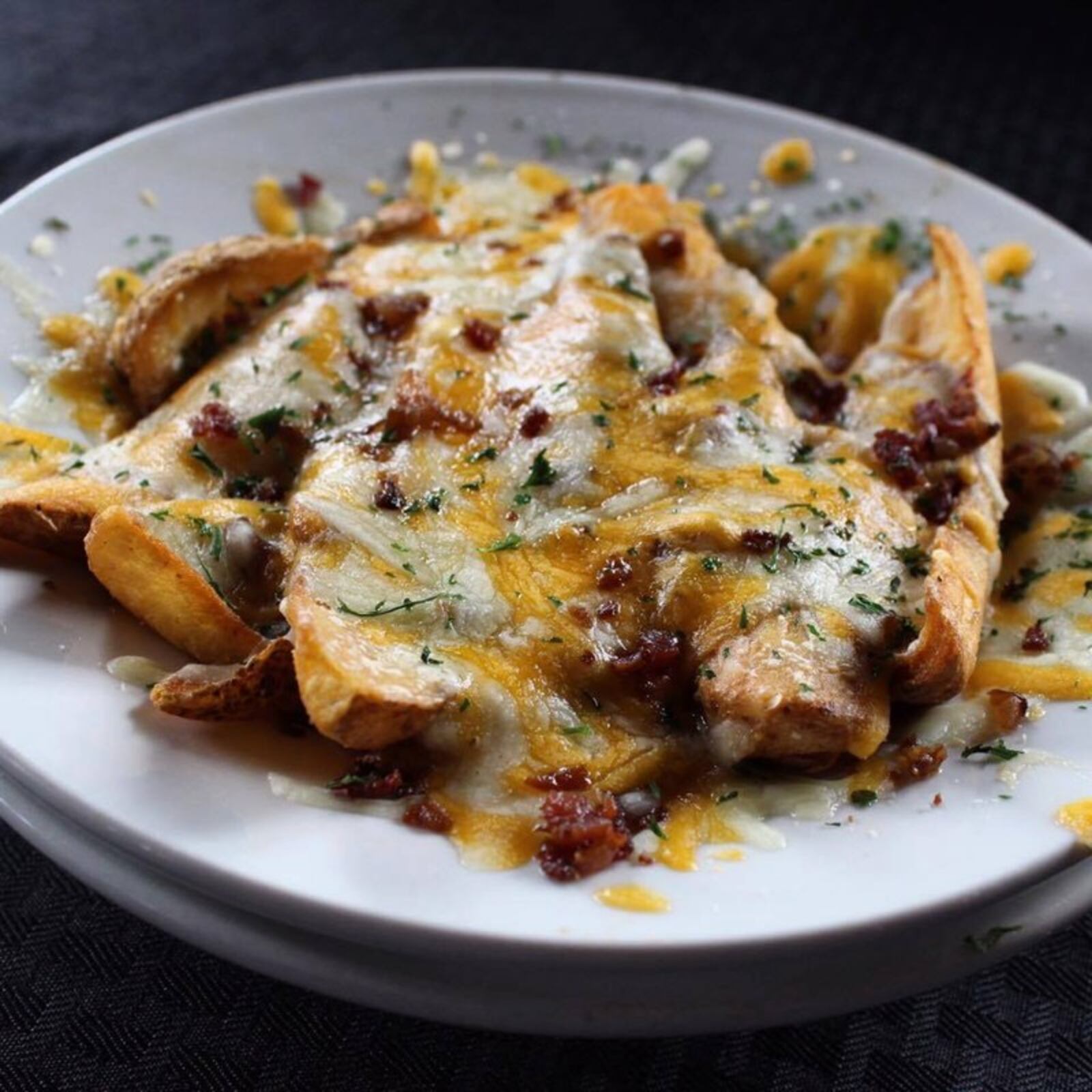 Dublin Pub sells a poutine version of its pub fries, a local favorite. ALLEGRA CZERWINSKI/STAFF