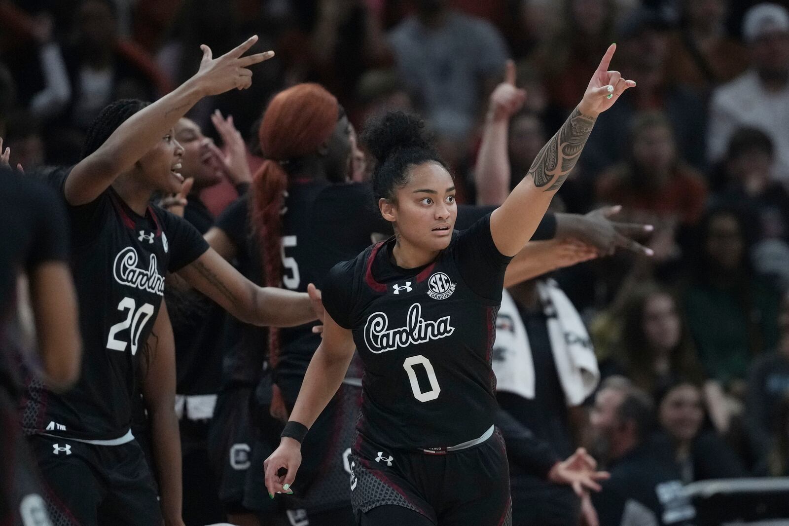 South Carolina guard Te-Hina Paopao (0) celebrates after a score against Texas during the second half of an NCAA college basketball game in Austin, Texas, Sunday, Feb. 9, 2025. (AP Photo/Eric Gay)