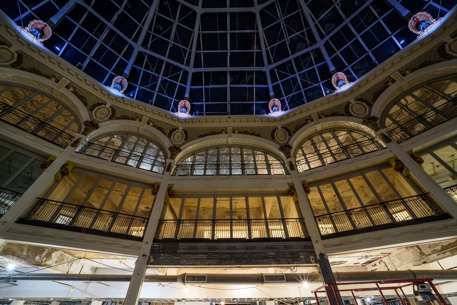 Construction continues to move closer to the finish line for Phase 1 of The Dayton Arcade redevelopment project in downtown Dayton. Up-lighting for the Rotunda Building’s 16 turkeys was recently installed as well as storefronts along the concourse. In the McCrory Building, lighting, carpeting and painting are nearing completion along with framing for the basement office pods. This space will be part of The Hub Powered by PNC, a joint venture of the University of Dayton and The Entrepreneurs Center. In The Arts Lofts at the Arcade, painting and light fixture installations continue to progress. Mantles and china cabinets, historic fixtures of the Arcade’s 4th Street apartment building are currently undergoing refinishing. The Arcade redevelopment project is a collaboration between lead developer Cross Street Partners, Model Group and McCormack Baron Salazar. For more information including leasing, visit arcadedayton.com. TOM GILLIAM / CONTRIBUTING PHOTOGRAPHER