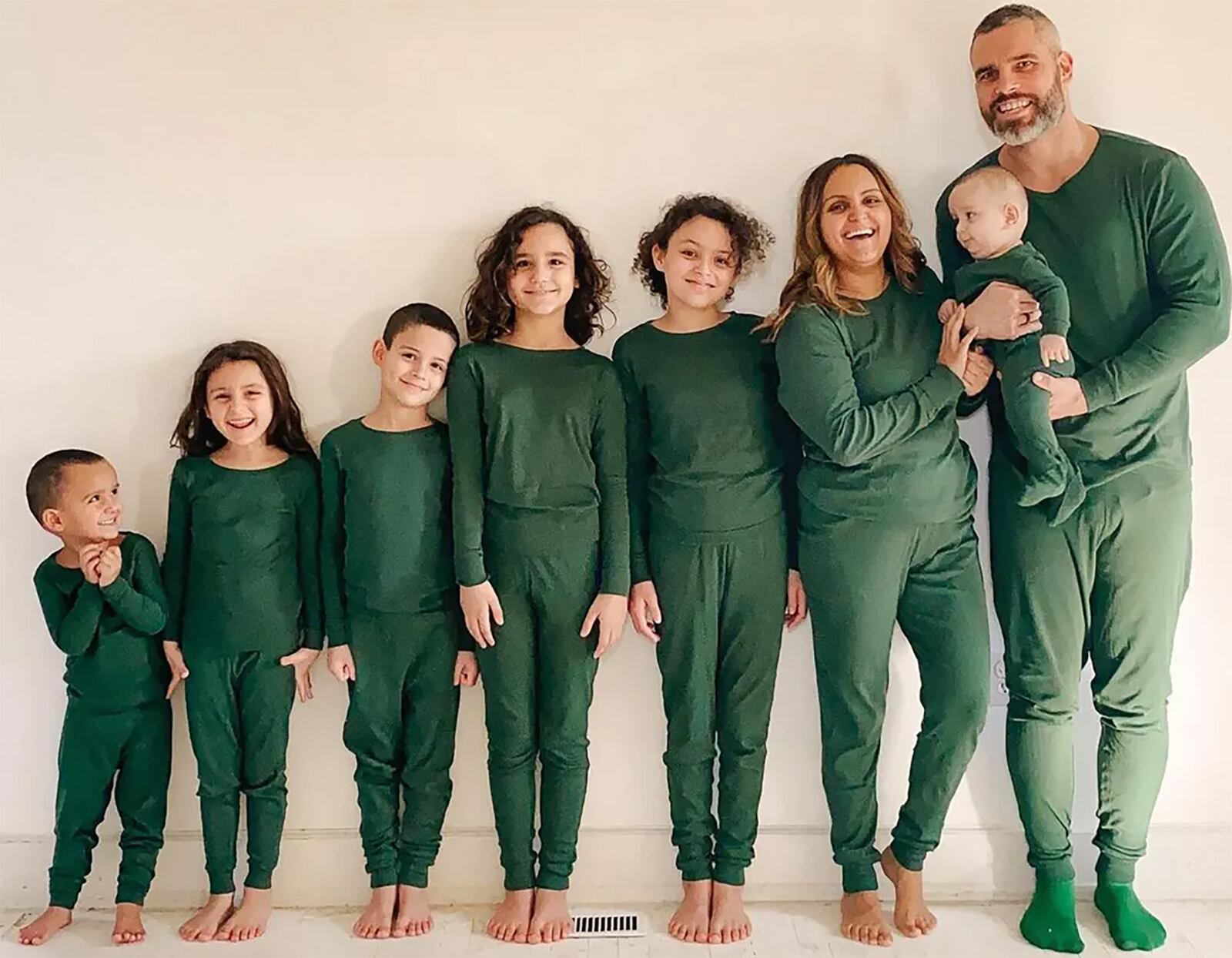 The Stearns family in December of 2022. Brenda created both Instagram and Facebook accounts to document her pregnancies and inspire others and her posts started going viral. Pictured, left to right, Benjamin, Vanessa, Samuel, Veronica, Victoria, Brenda and Isaiah (holding Ezra). CONTRIBUTED
