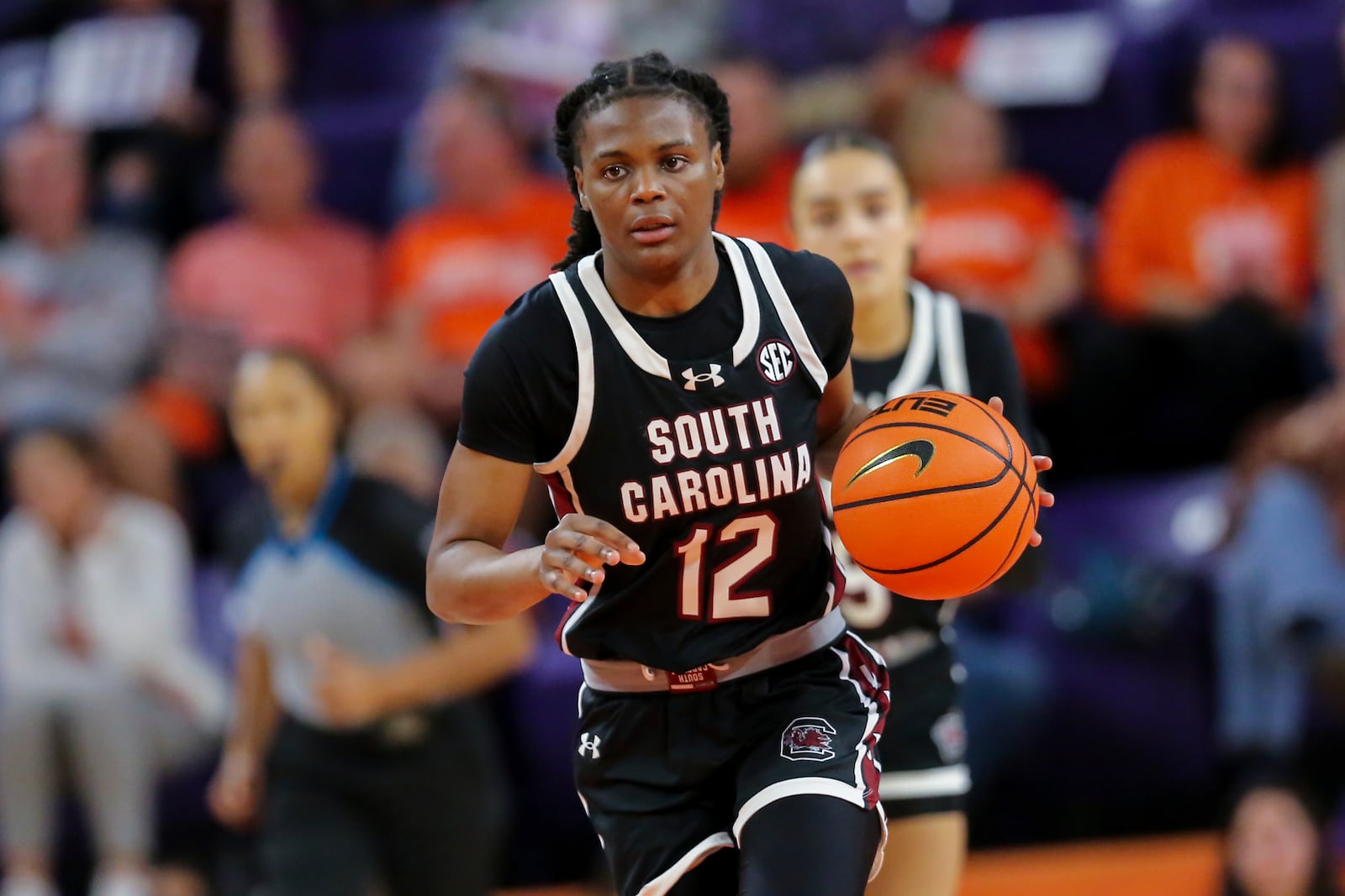 South Carolina guard MiLaysia Fulwiley (12) brings the ball up the court during the second half of an NCAA college basketball game against Clemson Wednesday, Nov. 20, 2024, in Clemson, S.C. (AP Photo/Artie Walker Jr.)