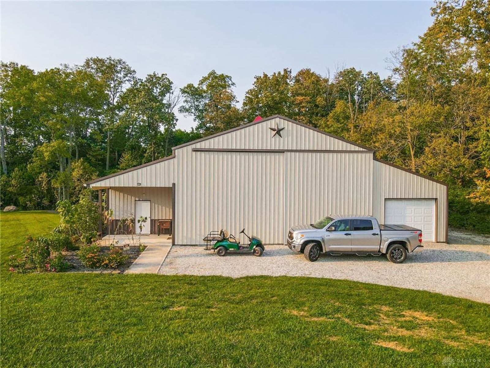 Off the driveway is a 60 foot-by-48-foot heated outbuilding with a 6-car drive-through garage, 16-foot doors, a workshop, concrete flooring and a second-floor storage area. CONTRIBUTED PHOTO