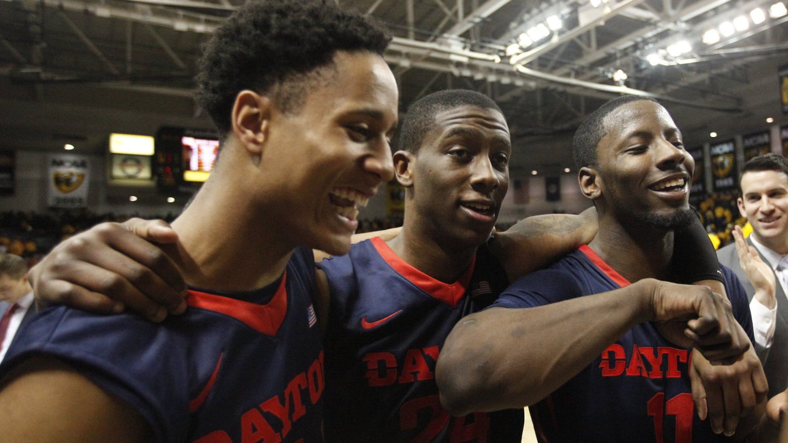 Dayton���s Darrell Davis, Jordan Sibert and Scoochie Smith leave the floor after a win against Virginia Commonwealth on Saturday, Feb. 28, 2015, at the Siegel Center in Richemond, Va. David Jablonski/Staff