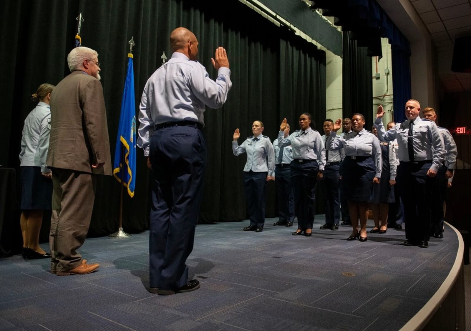 Col. Marqus Randall, then the National Space Intelligence Center commander, administers the oath of office to former Army officers during an interservice transfer ceremony Dec. 16, 2022, at the National Museum of the U.S. Air Force, Wright-Patterson Air Force Base. In the ceremony, 11 former soldiers and 125 former Air Force civilian employees were sworn into the Space Force. (U.S. Air Force photo by R.J. Oriez)