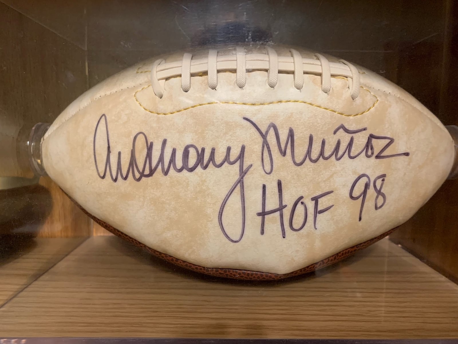 A football autographed by NFL Hall of Famer and Bengal great Anthony Munoz is a prized possession for Barb McCoy. CONTRIBUTED