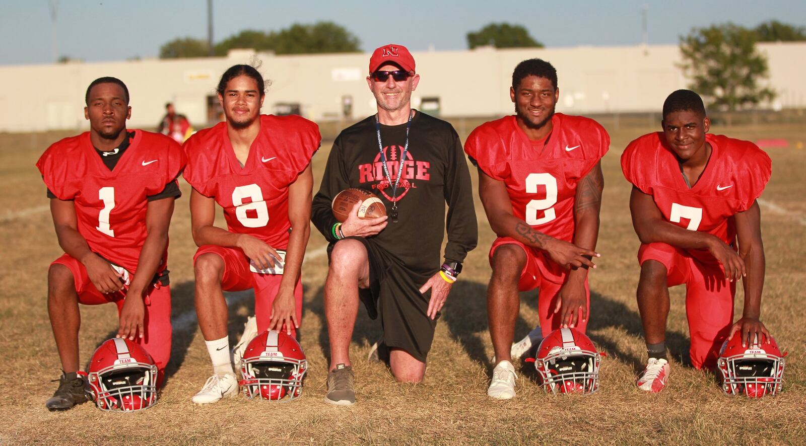 Veteran Northridge High School football coach Bob Smith (middle) has guided the Polar Bears to a 3-0 start, featuring seniors Jerron Lander (left), Darryl Story Jr., Shawn Shehee and junior Matt Moon. MARC PENDLETON / STAFF