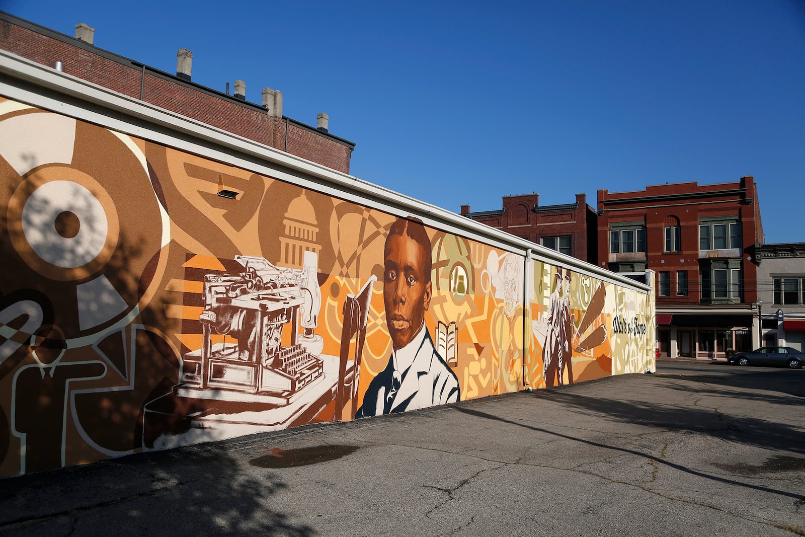 In Daytons Wright-Dunbar neighborhood the Dayton Regions Walk of Fame mural, in the 1100 block of W. Third Street, commemorates poet Paul Laurence Dunbar and aviation pioneers Orville and Wilbur Wright. LISA POWELL / STAFF