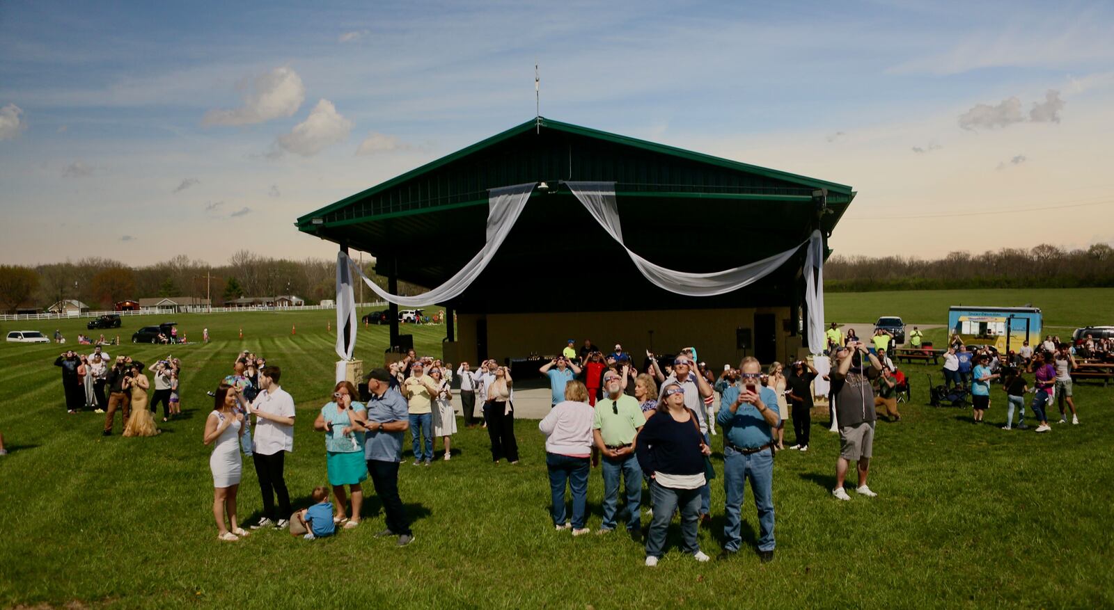 22 couples were married during a ceremony at Trenton Community Park held during the total solar eclipse, Monday, April 8, 2024. GREG LYNCH/STAFF