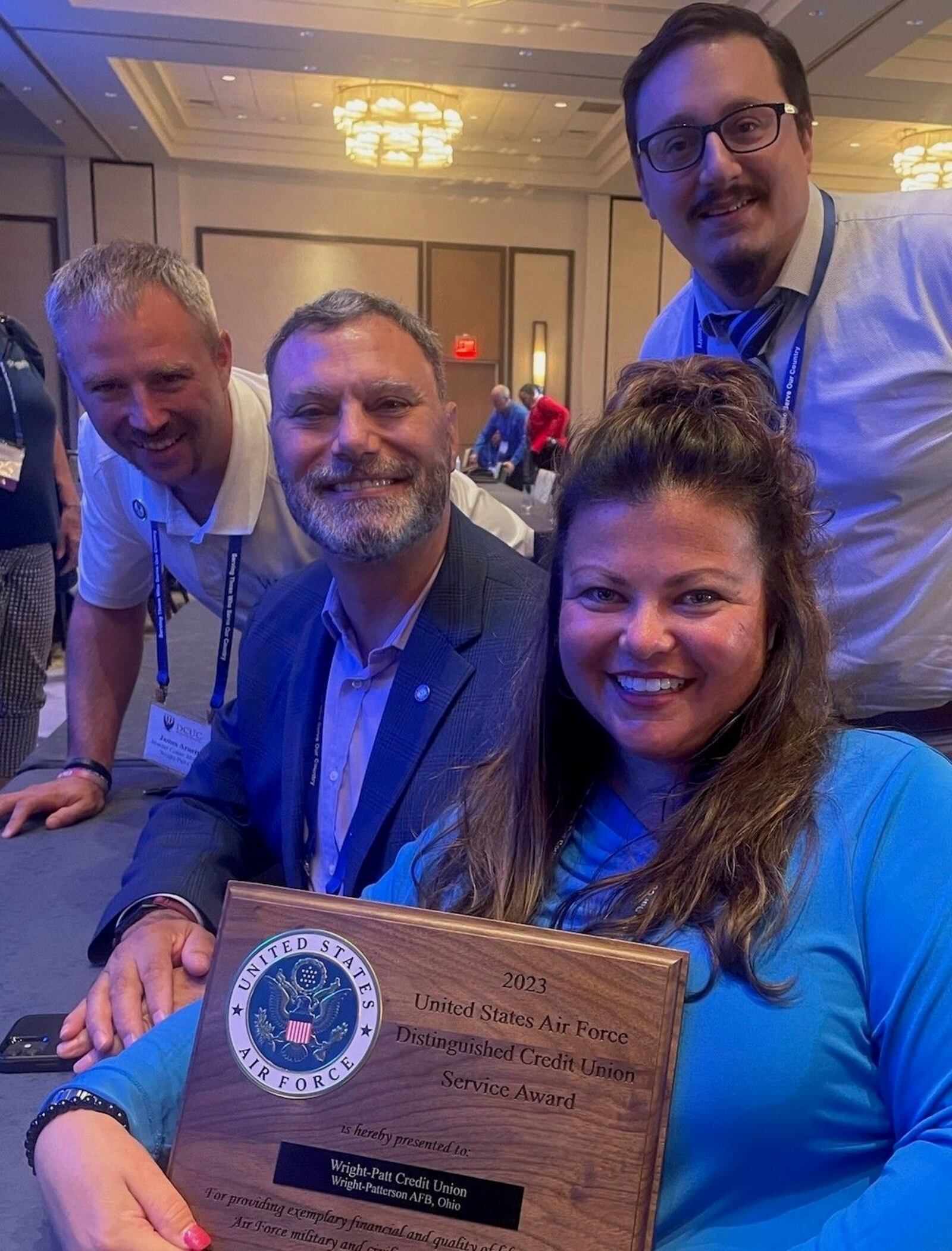 Pictured from left to right are Jay Arnett, member center manager; Kevin Johnson, chief information officer; Jayme Bettinger, regional director, member center operations and Stephen Basile, member center manager, rear. WPCU photo