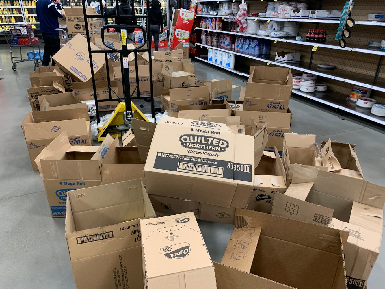 PHOTOS: Long lines, empty shelves at local grocery stores