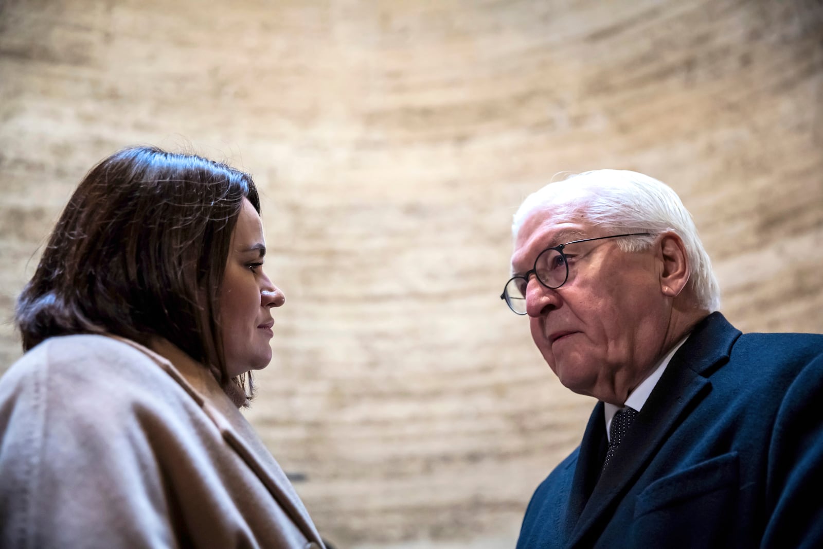 German President Frank-Walter Steinmeier, right, and Belarusian opposition leader Svetlana Tikhanovskaya talk to each other before a prayer at the central commemorative event to mark 35 years of peaceful revolution and the fall of the Berlin Wall, in the Chapel of Reconciliation at the Berlin Wall Memorial, Saturday, Nov. 9, 2024. Christoph Soeder/dpa via AP)