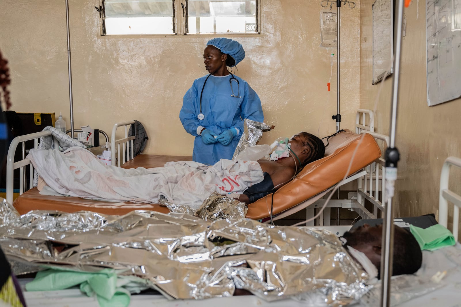 People wounded in the fighting between M23 rebels and Congolese armed forces arrive at the Cbeca Ndosho hospital in Goma, Democratic Republic of the Congo, Thursday, Jan. 23, 2025. (AP Photo/Moses Sawasawa)