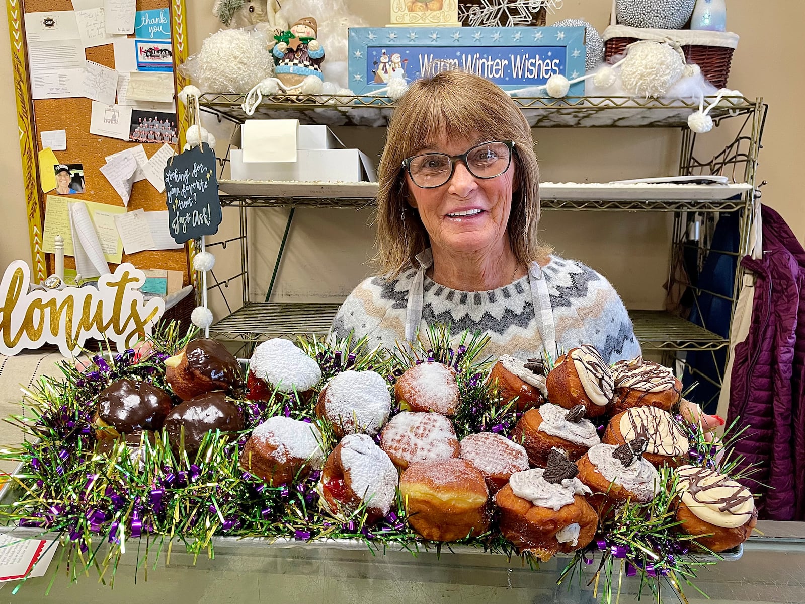 Ashley’s Pastry Shop, located at 21 Park Ave. in Oakwood, has a variety of paczki, pronounced “punch-key,” a Fat Tuesday treat that originated in Poland. Pictured is Theresa Hammond, owner of Ashley’s Pastry Shop.