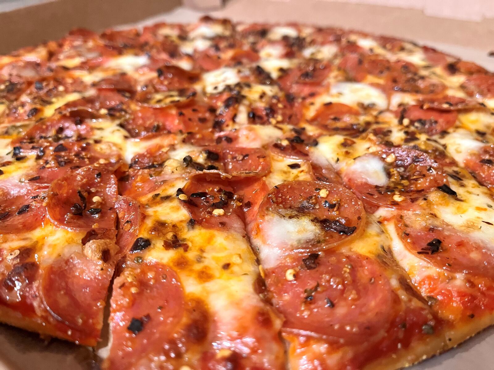 Hot Honey Pepperoni Pizza from Donatos. The pizza features pepperoni, fresh mozzarella, crushed pepper and Mike’s Hot Honey. NATALIE JONES/STAFF