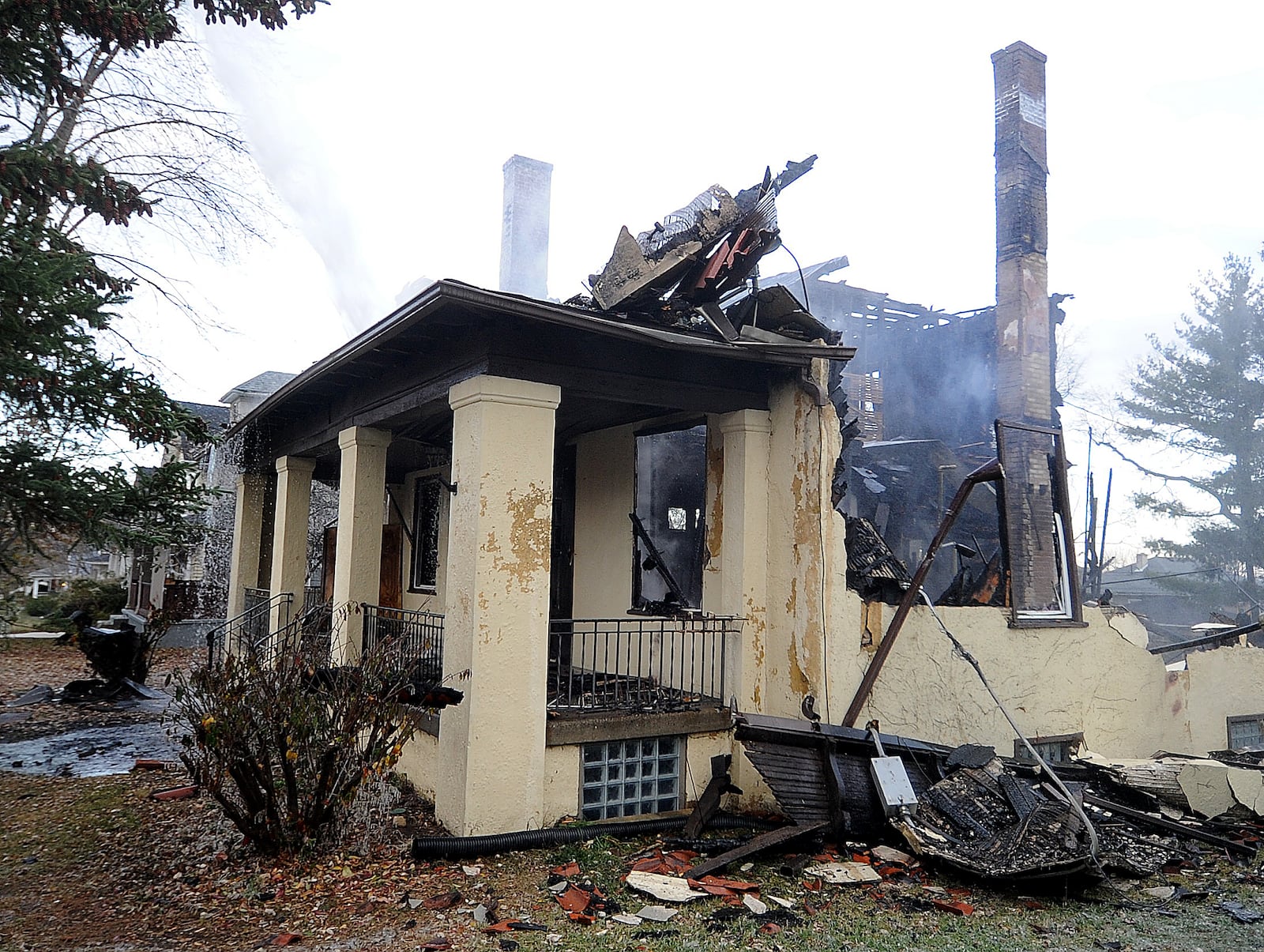 A vacant house was destroyed after an early morning fire in the 1300 block of Huffman Avenue in Dayton, Wednesday morning, Nov. 29, 2023. An emergency demolition was ordered. MARSHALL GORBY\STAFF