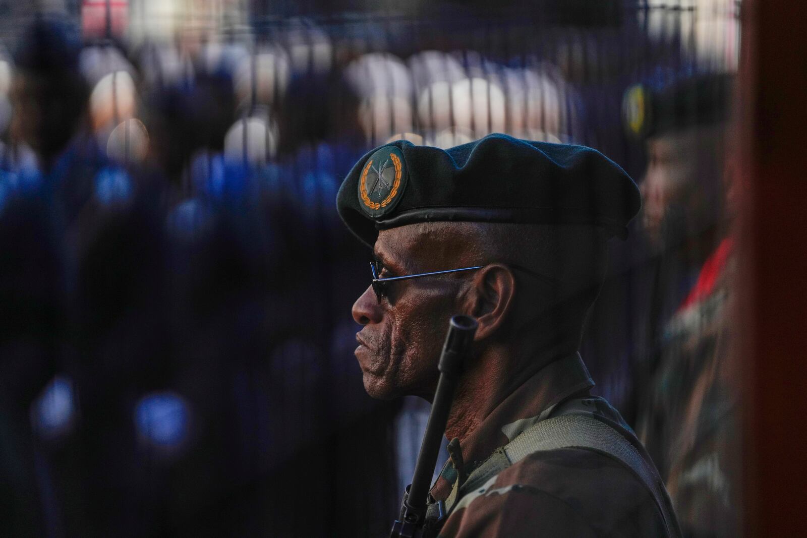 South African soldiers and veterans line up the street leading to Cape Town's city hall where South African President Cyril Ramaphosa will deliver his annual state of the union address Thursday, Feb. 6, 2025. (AP Photo/Nardus Engelbrecht)