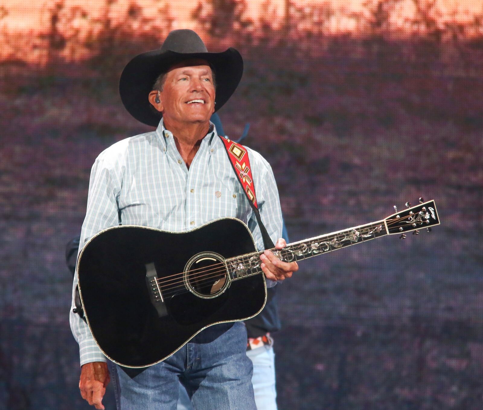 George Strait will perform May 27 at the Buckeye Country Superfest 2023. (Photo by Jack Plunkett/Invision/AP)