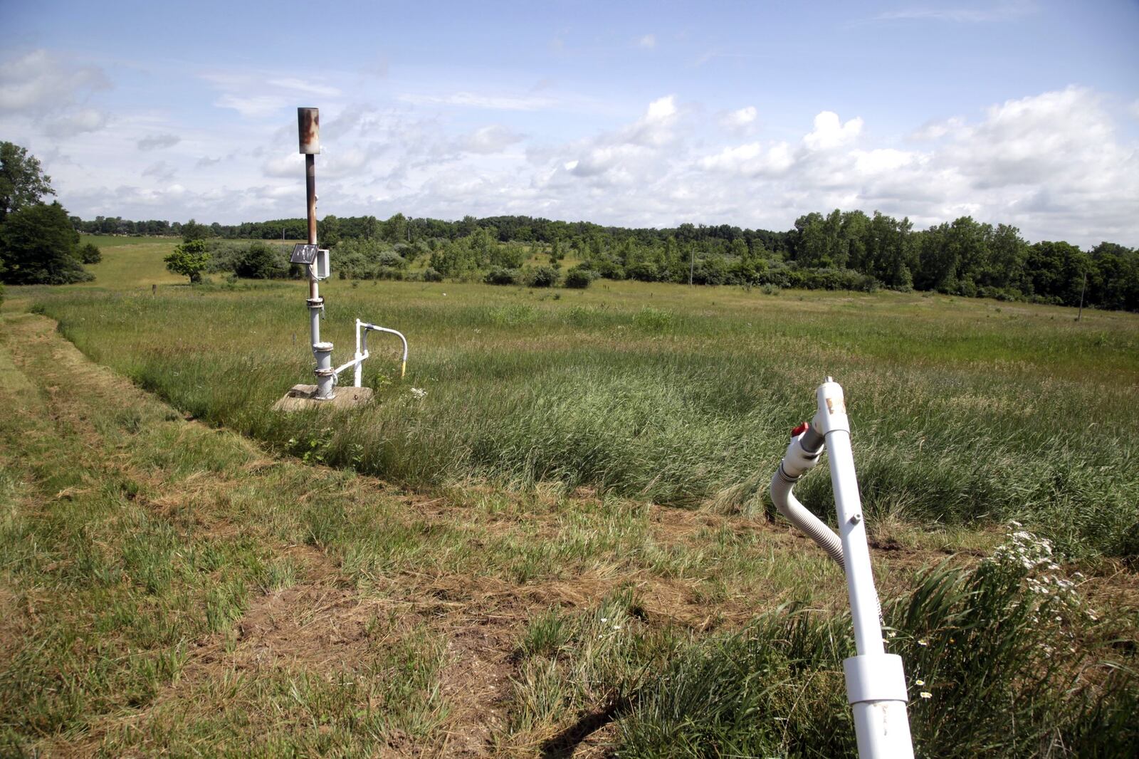 The Tremont City Barrel Fill just north of Springfield is one of several old industrial sites and landfills that pose potential threats to the massive underground aquifer because of underground toxic waste from factories. BYRON STIRSMAN / STAFF