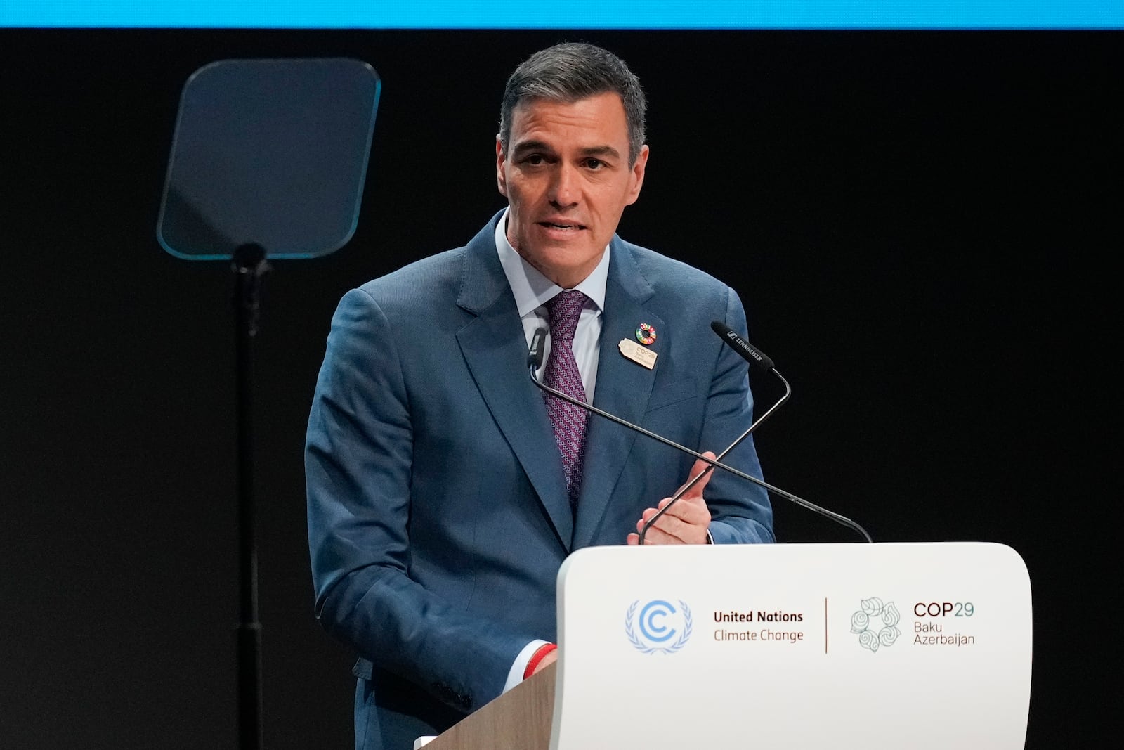 Spain President Pedro Sanchez speaks during a plenary session during a plenary session at the COP29 U.N. Climate Summit, Tuesday, Nov. 12, 2024, in Baku, Azerbaijan. (AP Photo/Rafiq Maqbool)