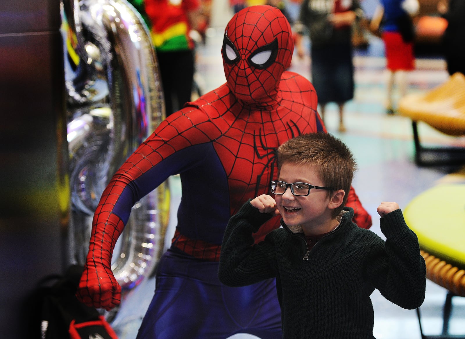 Toby McMahon, 6, poses for a photo with Spider-Man Wednesday, Jan. 31, 2024, at the 11th annual Superhero Day at Dayton Children’s Hospital. The tradition honors a patient who loved superheroes. The event also recognizes other superheroes, too — the patients, families, caregivers and staff at Dayton Children’s Hospital. MARSHALL GORBY\STAFF