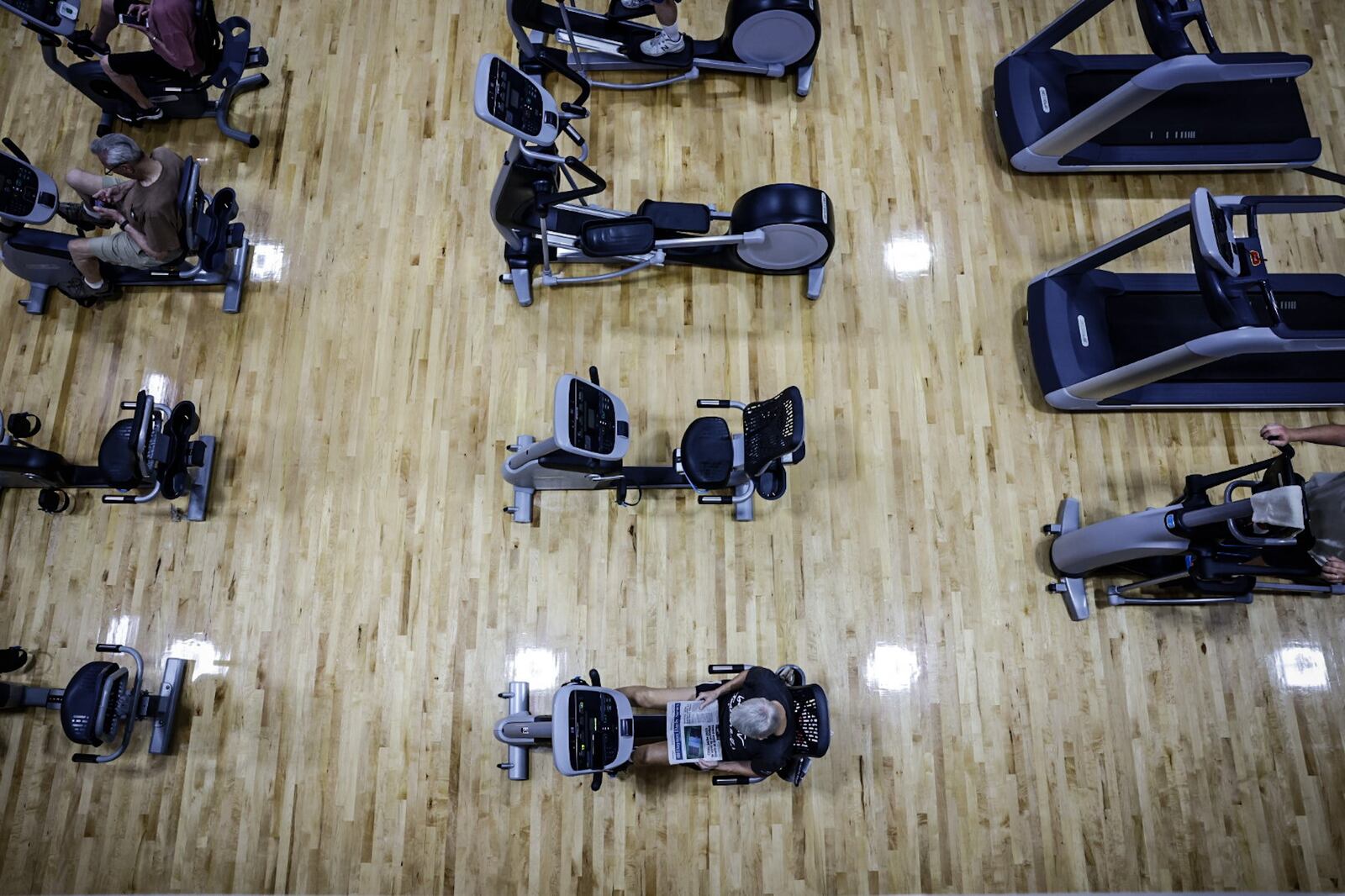 Members of the Washington Township RecPlex workout on new machines Wednesday, July 5, 2023. The RecPlex fitness center has numerous upgrades including 5,000 square feet of added space. JIM NOELKER/STAFF