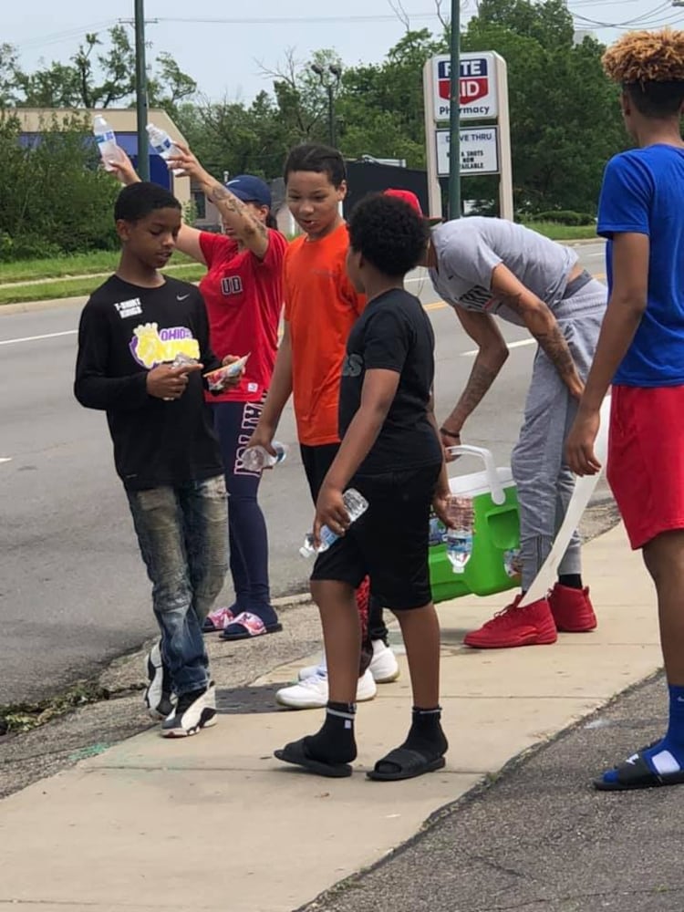 PHOTOS: People helping people after devastating tornadoes strike Miami Valley