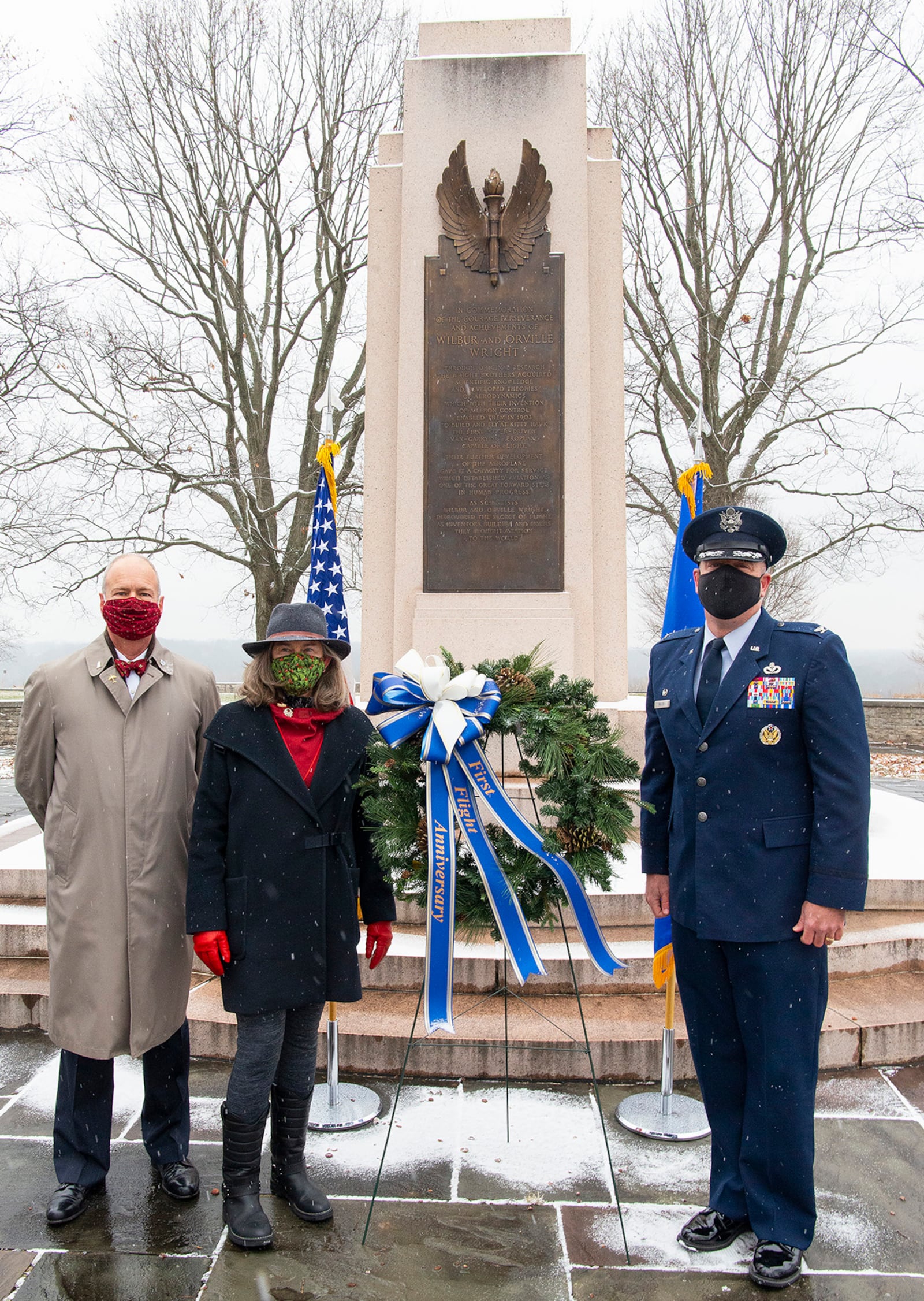 Amanda Wright Lane and Stephen Wright, great-grandniece and great-grandnephew of the Wright brothers, along with Col. Patrick Miller, 88th Air Base Wing and installation commander, lay a wreath at the Wright Brothers Memorial on Dec. 17 during the 2020 First Flight anniversary. The memorial overlooks Huffman Prairie, where the Wright brothers taught themselves and others how to fly. U.S. AIR FORCE PHOTO/R.J. ORIEZ