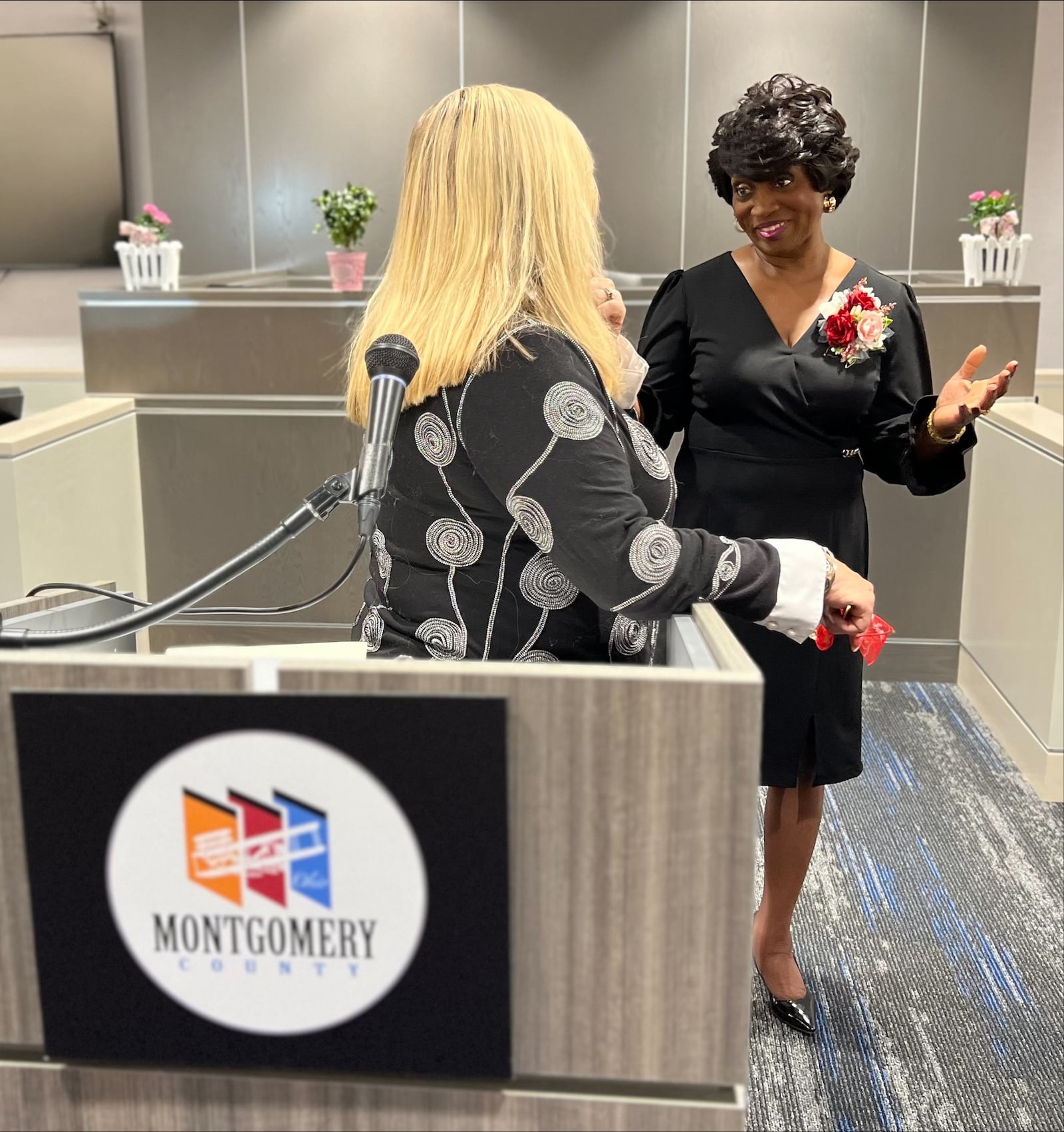 Trotwood Mayor Mary McDonald (right) talks to Montgomery County Commissioner Debbie Lieberman on Friday, March 10, 2023, at an open house for the Montgomery County Municipal Court’s new Western Division site in Trotwood. AIMEE HANCOCK / STAFF