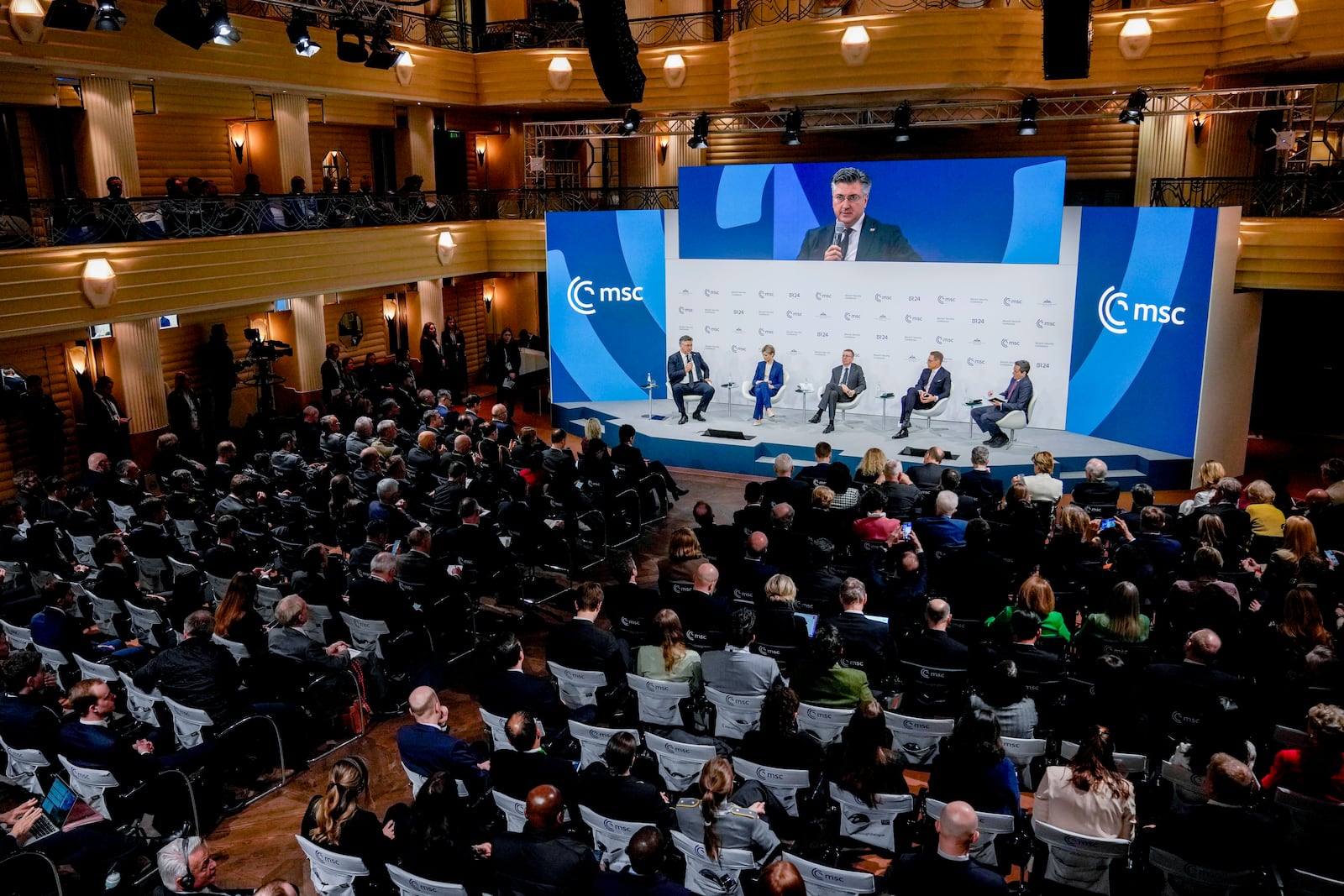 Andrej Plenkovic, Prime Minister, Republic of Croatia, Kristr˙n Mjoll Frostadottir, Prime Minister of Iceland, Alexander Stubb, President of Finland and Edgars Rinkevics, President of Latvia, from left, speak as part of a panel discussion during the Munich Security Conference at the Bayerischer Hof Hotel in Munich, Germany, Sunday, Feb. 16, 2025. (AP Photo/Matthias Schrader)